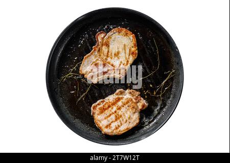 Gegrillte Schweinekoteletts in einer Pfanne. Bio-Fleischsteak. Isolieren, weißer Hintergrund Stockfoto