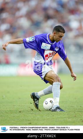 FUSSBALL - FRANZÖSISCHE MEISTERSCHAFT 2003/04 - 030802 - TOULOUSE FC GEGEN RC STRASSBURG - NABIL TAIDER (TOU) - FOTO LAURENT BAHEUX / FLASH PRESS Stockfoto