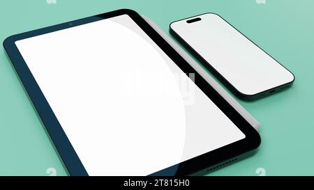 Tablet und Smartphone mit leerem grünem Display auf der Oberfläche. Stockfoto
