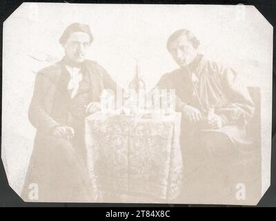 Andreas Groll zwei junge Männer, einer im Maler mit Pfeife, drei Viertel Figuren, sitzen an einem gedeckten Tisch. Salzdruck um 1848-1850 Stockfoto