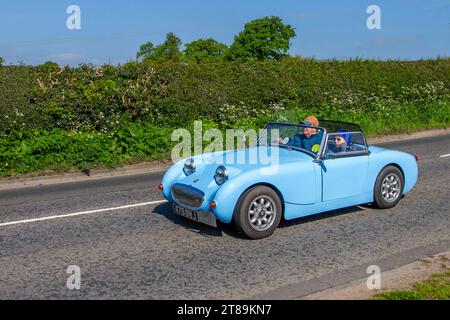 1959 50er Jahre Blue Austin Healey Frogeye Sprite; Vintage, restaurierte britische Klassiker, Automobilsammler, Motorenliebhaber und historische Veteranen reisen in Cheshire, Großbritannien Stockfoto