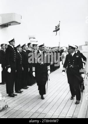König Georg VI. Inspizierte die Seeleute seiner Royal Navy Escort während seines Besuchs in Nordamerika im Juni 1936. Stockfoto