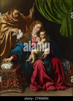 Heilige Familie, 1613, Luis Tristán, Spanisch, 1586–1640, 56 x 43 Zoll (142,24 x 109,22 cm) (Leinwand)73 1/2 x 61 1/4 x 3/8 Zoll (186,69 x 155,58 x 8,57 cm) (Außenrahmen), Öl auf Leinwand, Spanien, 17. Jahrhundert, mit intensivem Realismus, und nicht so subtile Symbolik: die Heilige Familie (Maria, Joseph und Jesus) ist in einem sehr intimen Moment gefangen. Die jungen Eltern kuscheln ihr Kind, das für einen Moment aufhört zu säugen und den Betrachter anstarrt, achtlos gegenüber der Taube, die der Vater ihm zeigt, was auf den Heiligen Geist anspielt. Die gravierenden Ausdrucksformen der Figuren antizipieren die kommende Tragödie. Stockfoto