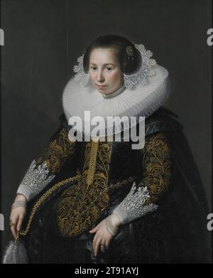 Porträt von Catharina van Voorst, 1628, Paulus Moreelse, Niederländisch, 1571–1638 39 x 31 1/2 Zoll (99,1 x 80,0 cm), Öl auf Platte, Niederlande, 17. Jahrhundert, Catharina van Voorst (1595–1650), Lucas' Frau und Cousin, trägt prächtige Kleidung, darunter eine feine Plissee-Rüsche und Goldfäden. Ihre sorgfältig dargestellten Juwelen wurden wahrscheinlich von ihrem Mann gefertigt. Sie gebar neun Kinder, von denen sieben bis zur Reife überlebten. Zwei Söhne folgten ihrem Vater in seinen Beruf als Goldschmied und Juwelier Stockfoto