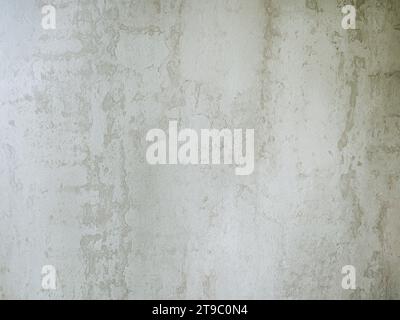 Zerkratzter alter, schmutziger Beton. Zement- oder sandstaubige Wandoberfläche. Hochauflösender abstrakter Texturhintergrund. Stockfoto