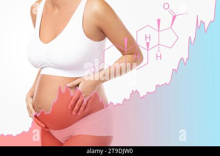 Junge Schwangere und steigender Progesteronhormonspiegel während der Schwangerschaft Stockfoto