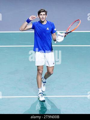 Der Italiener Matteo Arnaldi feiert den Sieg gegen Alexei Popyrin im Finale des Davis Cup 2023 im Palacio de Deportes Jose Maria Martin Carpena in Malaga, Spanien. Bilddatum: Sonntag, 26. November 2023. Stockfoto