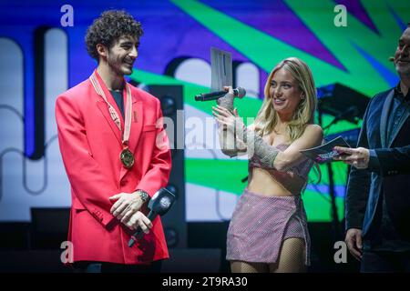Valencia, Spanien. November 2023. Gala mit den „MotoGP™ Beats: Lights Out“-Auszeichnungen im Fuente San Luis Pavillon in Valencia. 26. November 2023 im Bild: Francesco Bagnaia und Ana Mena Gala de entrega de los premios de 'MotoGP™ Beats: Lights Out' Celebrada en el en el Pabellón Fuente San Luis de Valencia. 26 de Noviembre de 2023 POOL/MotoGP.com/Cordon Pressebilder sind nur für redaktionelle Zwecke bestimmt. Obligatorischer Vermerk: © MotoGP.com Credit: CORDON PRESS/Alamy Live News Stockfoto