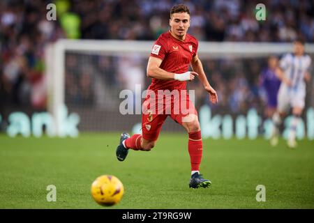 Adria Giner Pedrosa vom Sevilla FC in Aktion während des LaLiga EA Sports Spiels zwischen Real Sociedad und Sevilla FC in der Estadio reale Arena im November Stockfoto