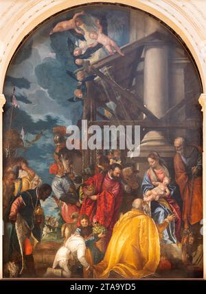 VICENZA, ITALIEN - 7. NOVEMBER 2023: Das Gemälde Baum Magi in der Kirche Chiesa di Santa Corona von Paolo Caliari - Veronese (1573). Stockfoto