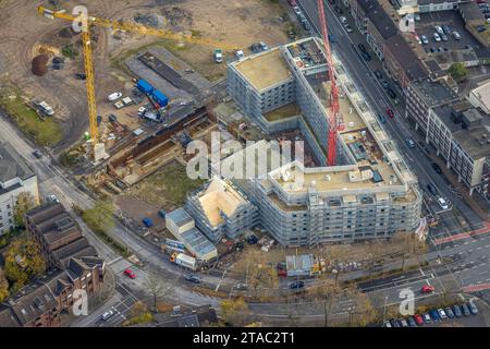 Luftbild, Mercator Quartier Baustelle für Neubau Hotel und Wohnungen, umgeben von herbstlichen Laubbäumen, Altstadt, Duisburg, Ruhrgebiet, Nordrhein-Westfalen, Deutschland ACHTUNGxMINDESTHONORARx60xEURO *** Luftblick, Mercator Quartier Baustelle für neue Hotels und Apartments, umgeben von herbstlichen Laubbäumen, Altstadt, Duisburg, Ruhrgebiet, Nordrhein-Westfalen, Deutschland ATTENTIONxMINDESTHONORARx60xEURO Credit: Imago/Alamy Live News Stockfoto