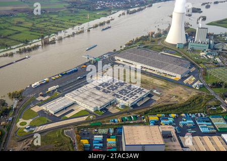 Luftbild, logport VI Sechs Industriegebiet Logistikdienste, STEAG Kraftwerk Walsum mit rauchendem Kühlturm am Fluss Rhein mit Hochwasser, Binnenschifffahrt, umgeben von herbstlichen Laubbäumen, Alt-Walsum, Duisburg, Ruhrgebiet, Nordrhein-Westfalen, Deutschland ACHTUNGxMINDESTHONORARx60xEURO *** Luftansicht, Logport VI Sechs Industriegebiet Logistikdienstleistungen, STEAG Kraftwerk Walsum mit Rauchkühlturm am Rhein mit Hochwasser, Binnenschifffahrt, umgeben von herbstlichen Laubbäumen, Alt Walsum, Duisburg, Ruhrgebiet, Nordrhein-Westfalen, Deutschland ATTENTIONxMINDESTHONORARx6 Stockfoto