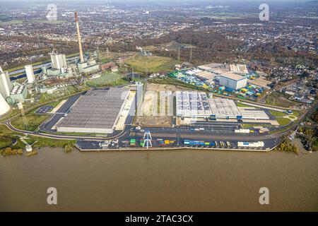 Luftbild, Logport VI Sechs Industriegebiet Logistikdienste mit Containerladeplatz, umgeben von herbstlichen Laubbäumen, Alt-Walsum, Duisburg, Ruhrgebiet, Nordrhein-Westfalen, Deutschland ACHTUNGxMINDESTHONORARx60xEURO *** Luftansicht, Logport VI sechs Industriegebiete Logistikdienstleistungen mit Containerladebereich, umgeben von herbstlichen Laubbäumen, Alt Walsum, Duisburg, Ruhrgebiet, Nordrhein-Westfalen, Deutschland ATTENTIONxMINDESTHONORARx60xEURO Credit: Imago/Alamy Live News Stockfoto