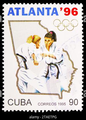 MOSKAU, RUSSLAND - 17. NOVEMBER 2023: In Kuba gedruckte Briefmarke zeigt Frauenjudo, Olympische Sommerspiele 1996 - Atlanta-Serie, um 1995 Stockfoto