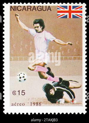 MOSKAU, RUSSLAND - 17. NOVEMBER 2023: Briefmarke gedruckt in Nicaragua zeigt Großbritannien, FIFA Fussball-Weltmeisterschaft 1986 - Mexiko-Serie, um 1986 Stockfoto