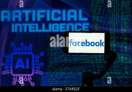Indien. Dezember 2023. In dieser Fotoabbildung wird das Logo von Facebook auf einem Mobiltelefon-Bildschirm mit KI (künstliche Intelligenz) im Hintergrund angezeigt. (Foto von Idrees Abbas/SOPA Images/SIPA USA) *** ausschließlich für redaktionelle Nachrichten *** Credit: SIPA USA/Alamy Live News Stockfoto