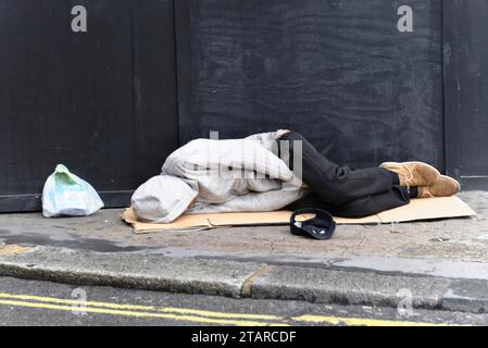 Obdachloser, schlafend, Oxford Street, London, Region London, England, Vereinigtes Königreich Stockfoto