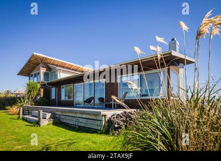 Strand am Curio Bay, Catlins, Südinsel, Neuseeland. Stockfoto