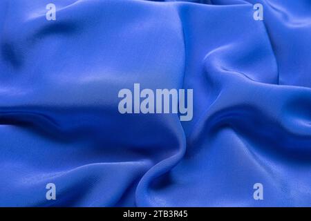 Oberflächenstruktur von blauem Gewebe in Nahaufnahme. Hintergrund Stockfoto