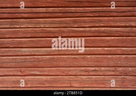 Altgealterte rot lackierte Holzplatten als organische Hintergrundstruktur Stockfoto