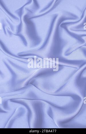 Blaue Seide oder Satin Luxus Stoff Textur. Draufsicht. Stockfoto
