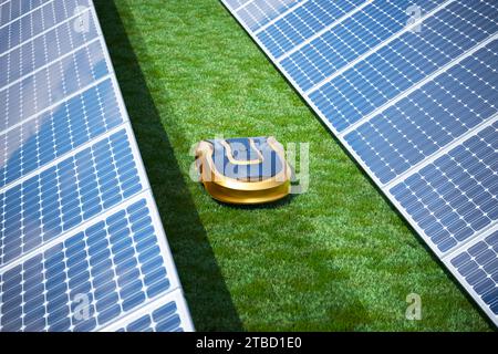 Autonomer Rasenmähroboter Inmitten Von Solaranlagen Für Wohnzwecke Stockfoto