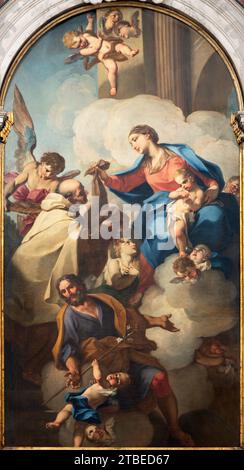 VICENZA, ITALIEN - 7. NOVEMBER 2023: Das Gemälde der Madonna von Scapular mit dem Heiligen Simon Stock und St. Jospeh in der Kirche Chiesa di San Marco Stockfoto