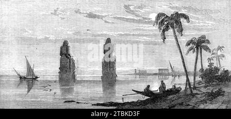 Influsion des Nils: Kolossale Statuen in der Theben-Ebene, 1861. "Die beeindruckenden Überreste dieser berühmten antiken Stadt, lange Hauptstadt Ägyptens, erstrecken sich über sieben Meilen an beiden Ufern des Nils, in Oberägypten, und präsentieren eine imposante Sammlung von antiken Denkmälern... [hier gezeigt] zwei riesige sitzende kolosse, von denen einer der gefeierte Memnon war... Ägypten schuldet, bekanntlich ist seine Existenz als produktive und bewohnbare Region bis zum Nil, deren periodische Überströmungen in anderen Ländern mehr als nur dem Zweck des Regens dienen; und dementsprechend in alten Zeiten die Vorteile Stockfoto