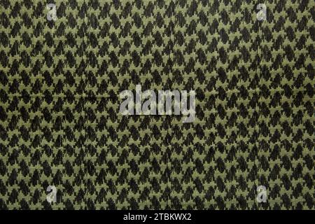 Keffieh Schal. Die Textur des traditionellen Baumwoll-symbolischen arabischen Schals. Khaki Hintergrund. Stockfoto