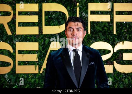 Dschidda, Saudi-Arabien. Dezember 2023. Henry Golding spaziert durch den roten Teppich, um an der Abschlusszeremonie oder dem 3. Roten Meer Film Festival in Dschidda, Saudi-Arabien, am 7. Dezember 2023 teilzunehmen. Foto: Balkis Press/ABACAPRESS.COM Credit: Abaca Press/Alamy Live News Stockfoto