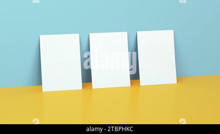 Drei weiße Poster Mockups auf blauem und gelbem Hintergrund mit Reflexion. Vorlage, Modell. Abbildung 3D-Rendering. Stockfoto