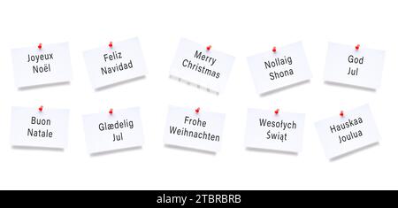 Weihnachtswünsche in verschiedenen Sprachen auf einem Notizblock Stockfoto