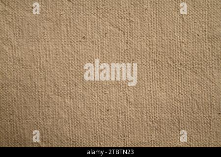 Nahaufnahme der beige Sackleinen-Leinwand-Textur in natürlichem Licht Stockfoto