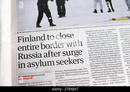 "Finnland schließt die gesamte Grenze zu Russland nach dem Anstieg der Zahl der Asylbewerber' Guardian-Zeitung übertitelt Migranten artikel 29 November 2023 London Vereinigtes Königreich Stockfoto