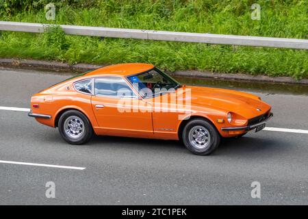 Orange Datsun 240Z aus den 1973 70er Jahren; Vintage, restaurierte klassische Motoren, Autosammler, Autofahrer, historische Veteranen, die im Großraum Manchester, Großbritannien, unterwegs sind Stockfoto