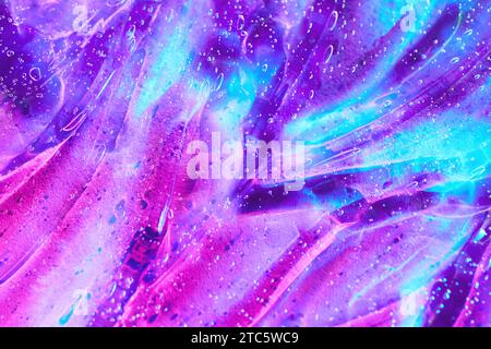 Magentarosa, lila Space Alien Glitzer Schleim Gel Hintergrund Textur Stockfoto