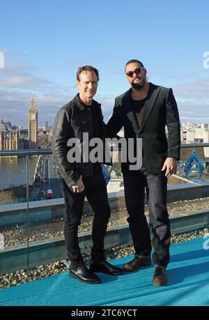 Patrick Wilson (links) und Jason Momoa während eines Fotorufs für Aquaman and the Lost Kingdom im Park Plaza Hotel, Westminster Bridge, London. Bilddatum: Montag, 11. Dezember 2023. Stockfoto