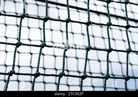 Knotenseil Mesh Nahaufnahme abstrakte isolierte Hintergrundmuster Nahaufnahme Stockfoto