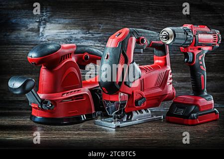Elektrische Handwerkzeuge rote kabelgebundene Stichsäge Akku-Bohrmaschine und Geschwindigkeit variable Leistung kleine Tauchfräse Fräsmaschine tragbare Mini-Holz-Router ein Stockfoto
