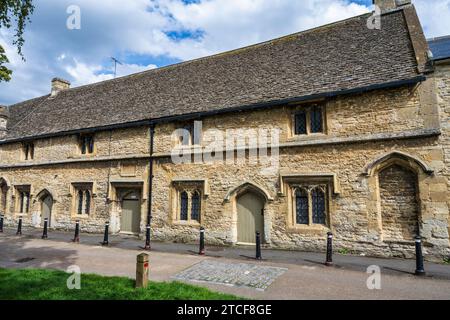 Almshouses in der Church Lane in Burford, Oxfordshire, England, Großbritannien Stockfoto