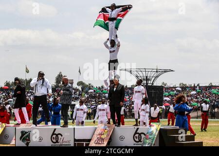 Nairobi, 12. Dezember jedes Jahres. Dezember 1963. Am 12. Dezember 2023 treten die Menschen während der Feierlichkeiten zum 60. Jahrestag der Unabhängigkeit Kenias in den Uhuru Gardens in Nairobi, Kenia, auf. Der kenianische Jamhuri Day oder Unabhängigkeitstag, der jedes Jahr am 12. Dezember stattfindet, ist einer der wichtigsten nationalen Feiertage in Kenia. Kenia erhielt seine Unabhängigkeit vom Vereinigten Königreich am 12. Dezember 1963. Quelle: Allan Mutiso/Xinhua/Alamy Live News Stockfoto