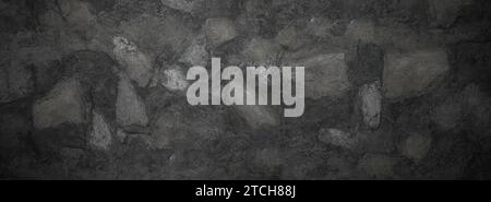 Schwarzer oder dunkelgrauer, rauer, körniger Steinhintergrund. Distress grob grau gerissene Wand Textur Grunge Hintergrund rauer Hintergrund, dunkler Beton f Stockfoto