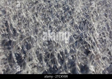 Kies, abstrakter Hintergrund, Wischeffekt, Glühlampenbelichtung Stockfoto