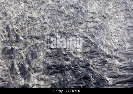 Kies, abstrakter Hintergrund, Wischeffekt, Glühlampenbelichtung Stockfoto