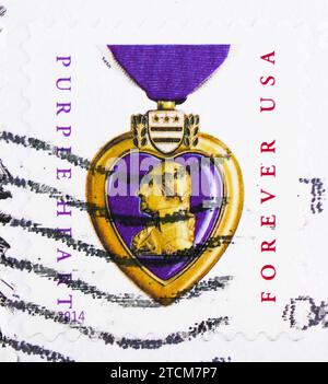 MOSKAU, RUSSLAND - 19. NOVEMBER 2023: Briefmarke gedruckt in den Vereinigten Staaten zeigt Purple Heart, Serie, um 2014 Stockfoto