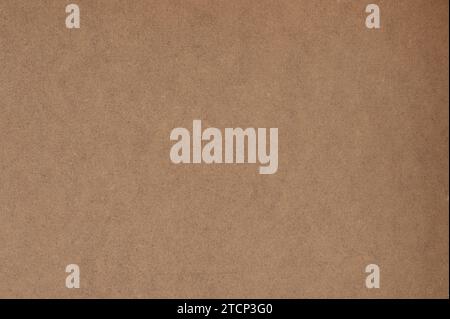 Komprimierte Holzhartplatte braune Textur Hintergrund Nahansicht Stockfoto