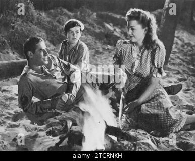 John Hodiak und Anne Baxter spielten 1945 in dem Film Sunday Dinner for a Soldier. Das waren große Namen im Hollywood der 1940er Jahre. Hodiak hatte viele großartige Rollen und Baxter war für ihre schauspielerischen Fähigkeiten bekannt und gewann sogar einen Academy Award. Dieser Film ist nur ein Beispiel für ihre Zusammenarbeit. Stockfoto