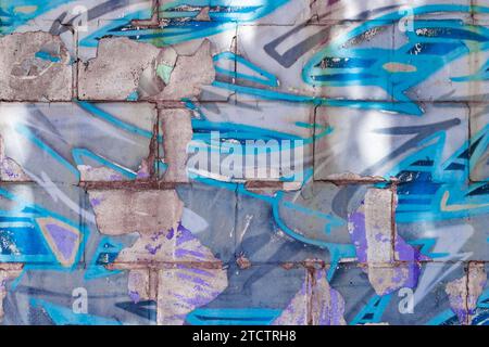 Blockwand-Hintergrundspray in Blautönen. Stockfoto