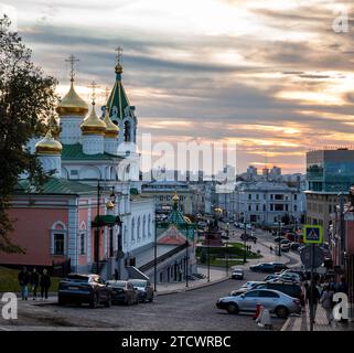 Nizhny Novgorod, Russia - September 29, 2023: View of the Church of the Nativity of John the Baptist and Rozhdestvenskaya street at sunset Stock Photo