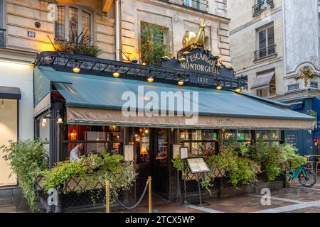 L'Escargot Montorgueil, ein klassisches, elegantes französisches Restaurant, das gehobene Köstlichkeiten, vor allem Schneckengerichte, in der Rue Montorgueil, Paris, Frankreich serviert Stockfoto